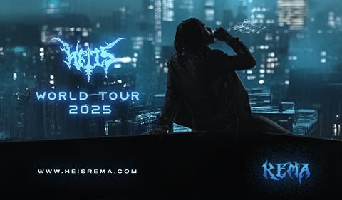 Rema sitting on a ledge overlooking a futuristic neon-lit cityscape, promoting his 2025 World Tour