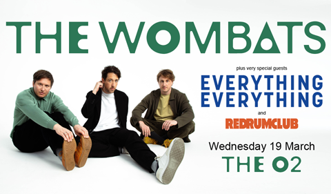 Promotional poster for The Wombats' concert featuring special guests Everything Everything and Red Rum Club. The band members are sitting on a white background with the event details, including the date (Wednesday, 19 March) and venue (The O2), displayed in bold green, blue, and orange text.