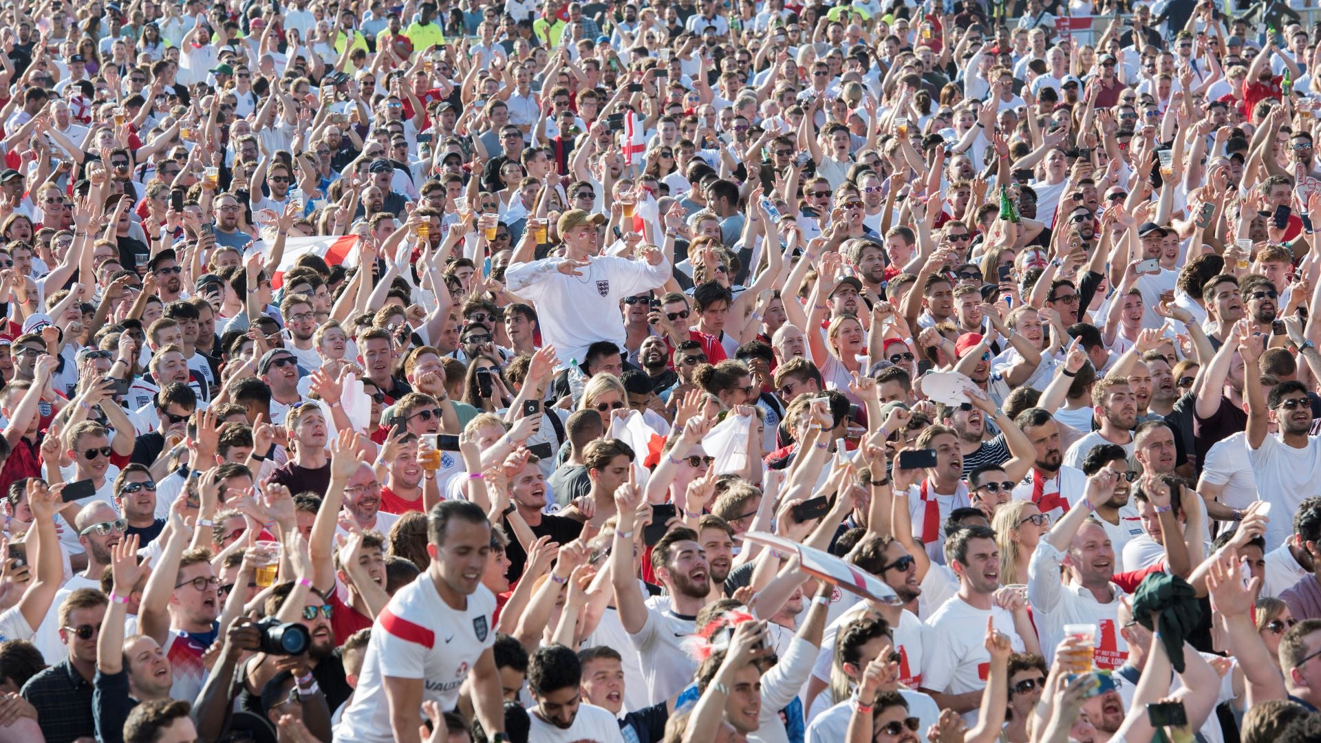 Crowd shot of people watching football